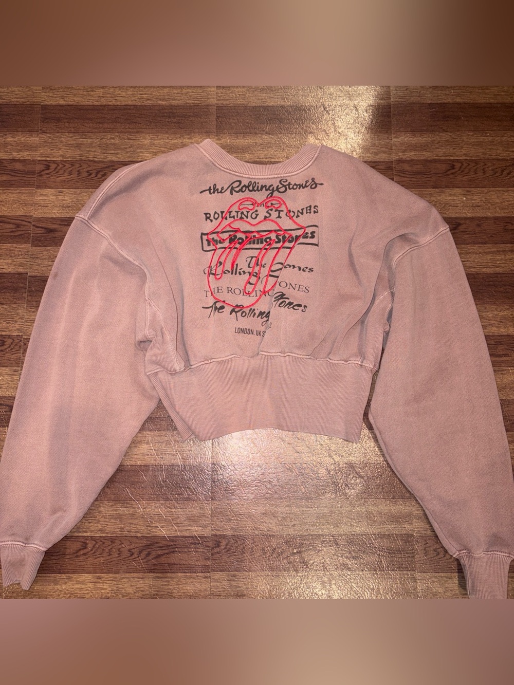 the Rolling Stones Pink Pullover Sweatshirt with Red Tongue Graphic